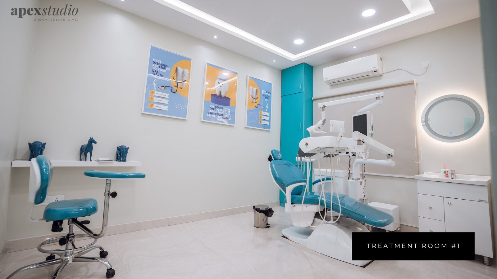 Treatment room one with teal dental chair