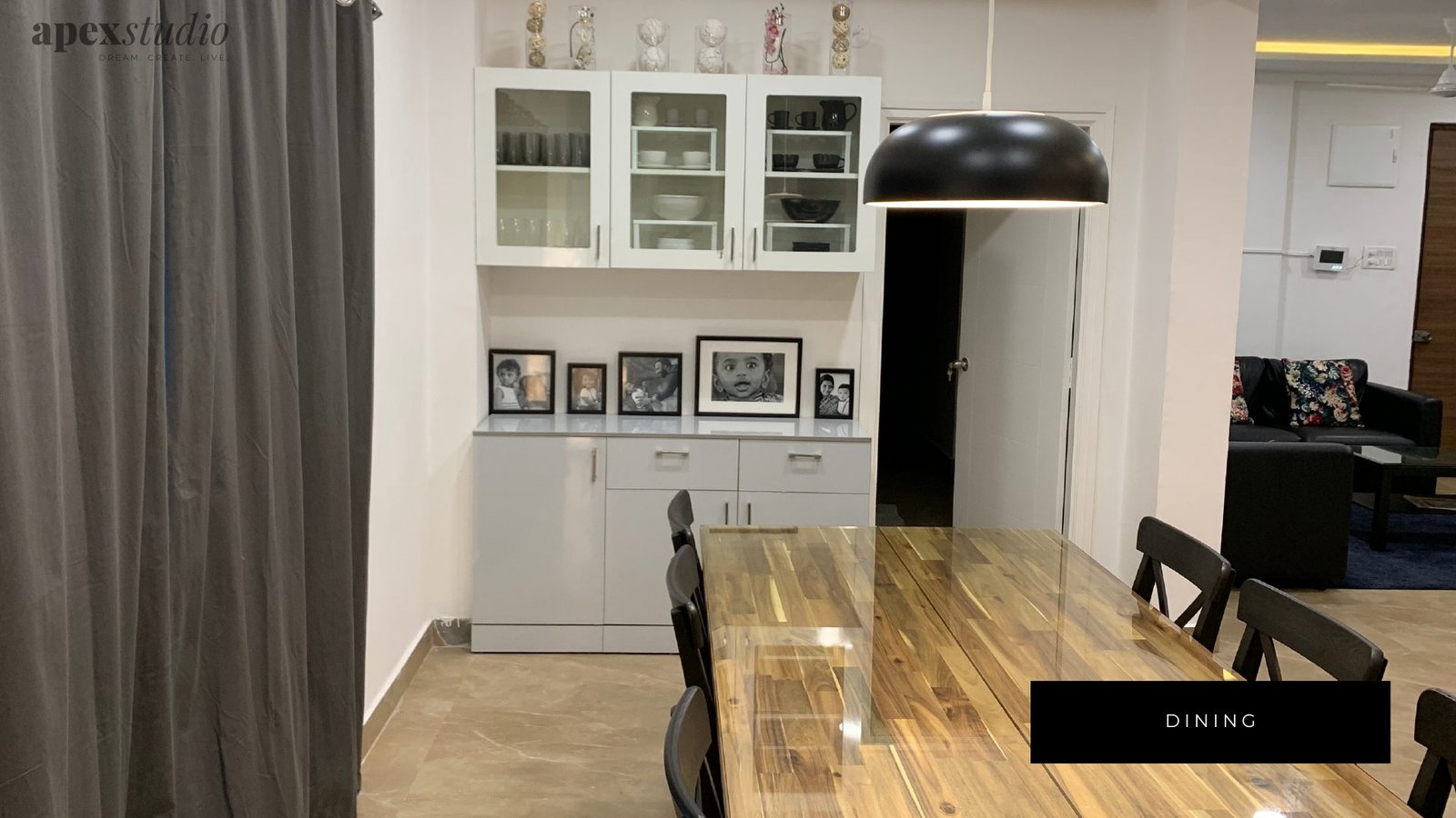 Dining crockery unit and black pendant light